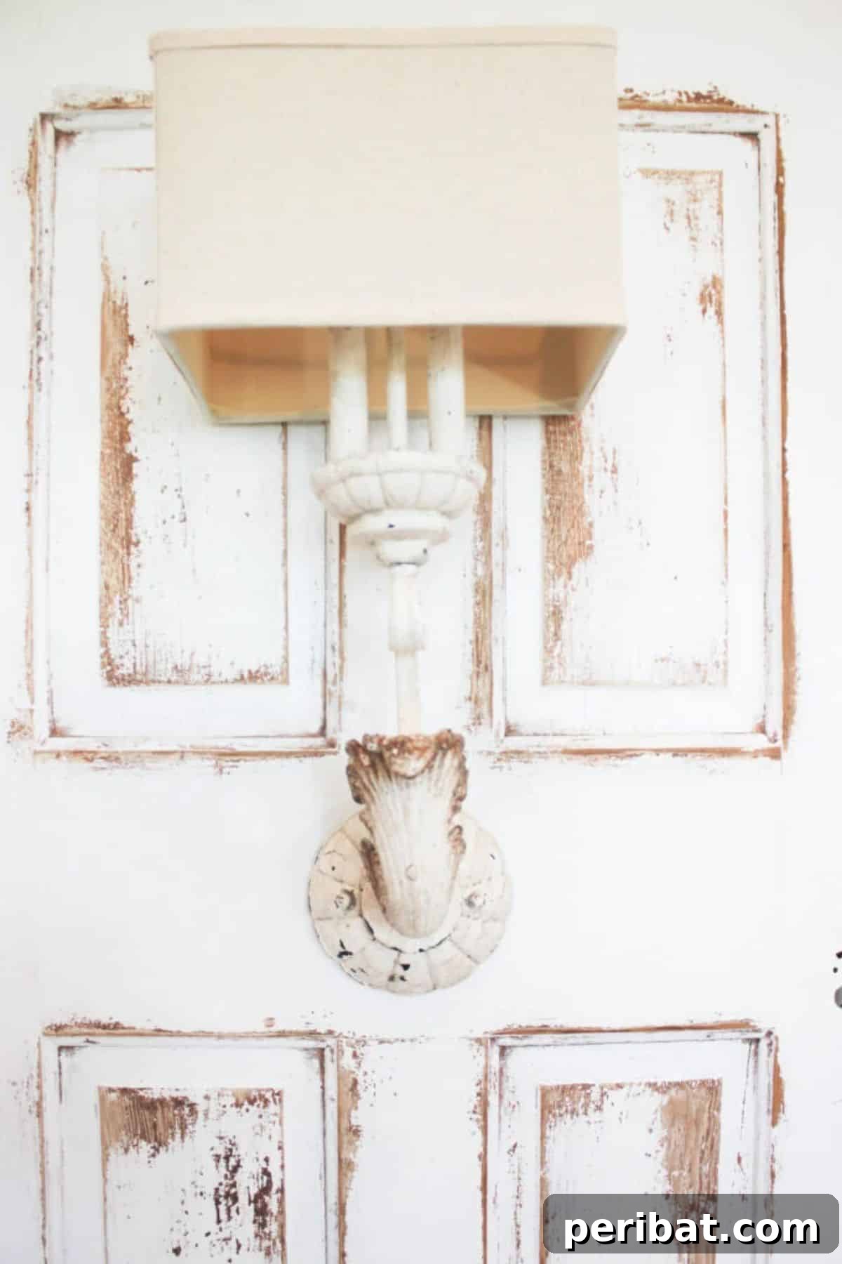 Unique rustic lighting fixture crafted from salvaged doors.
