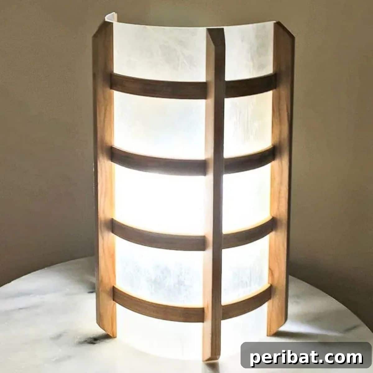 Sophisticated Japanese-style DIY wooden wall sconce for unique decor.