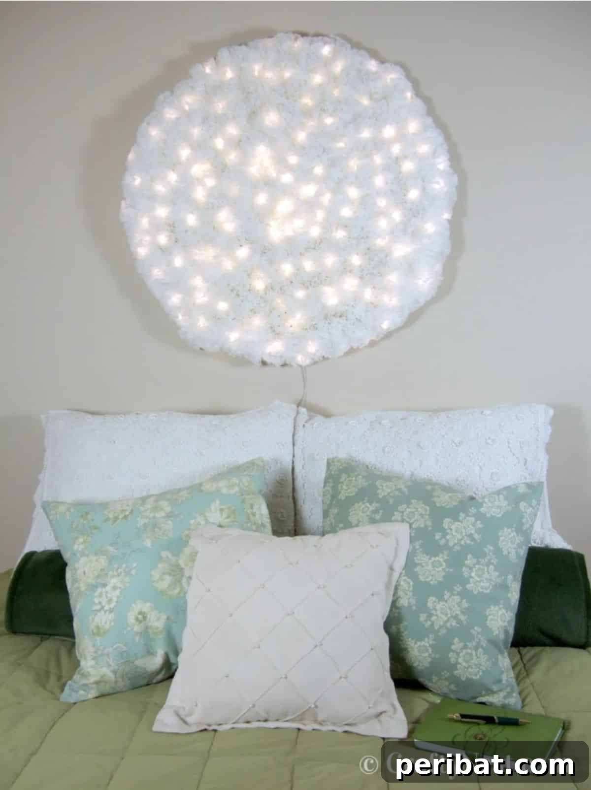 Enchanting DIY coffee filter snowball wall light for unique indoor decor.