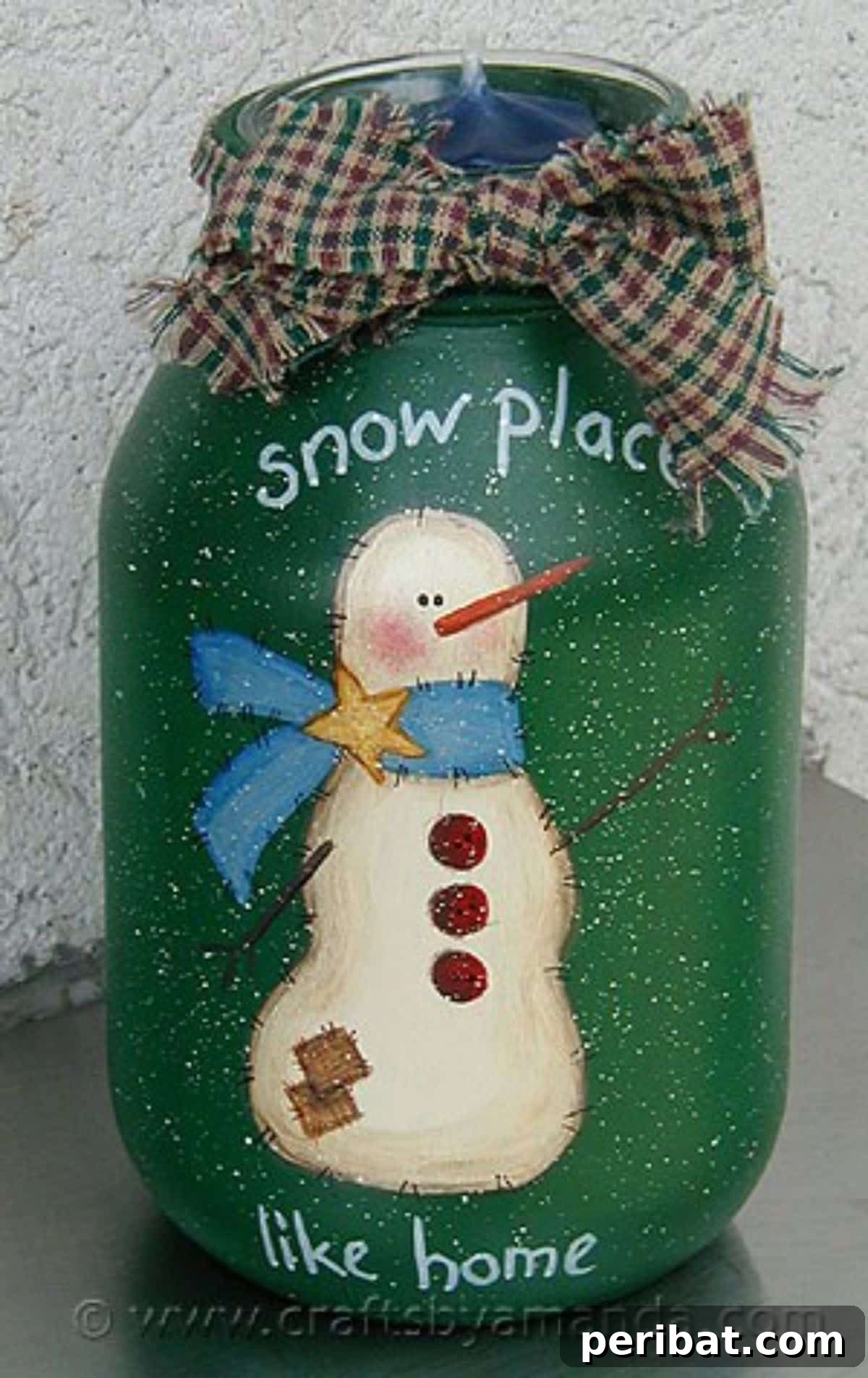 Festive DIY snowman painted jar light for cozy winter indoor decor.