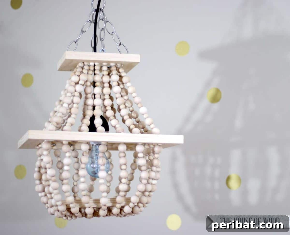 Elegant DIY beaded light fixture for enchanting indoor atmosphere.