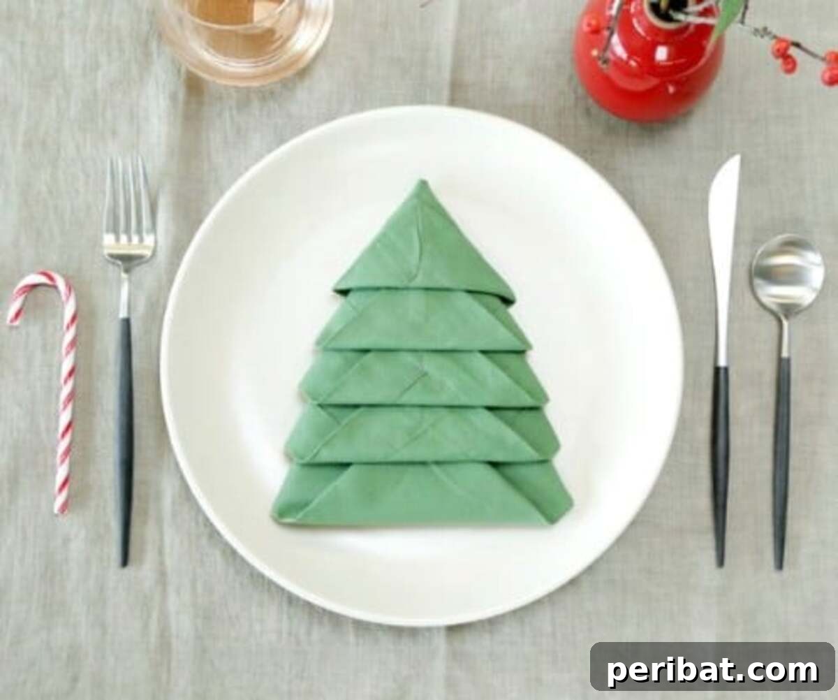 Deck Your Table: Napkins Transform into Christmas Trees 14 Amazing Folding Technique Turns Your Napkins into Christmas Trees - Arrange on your table