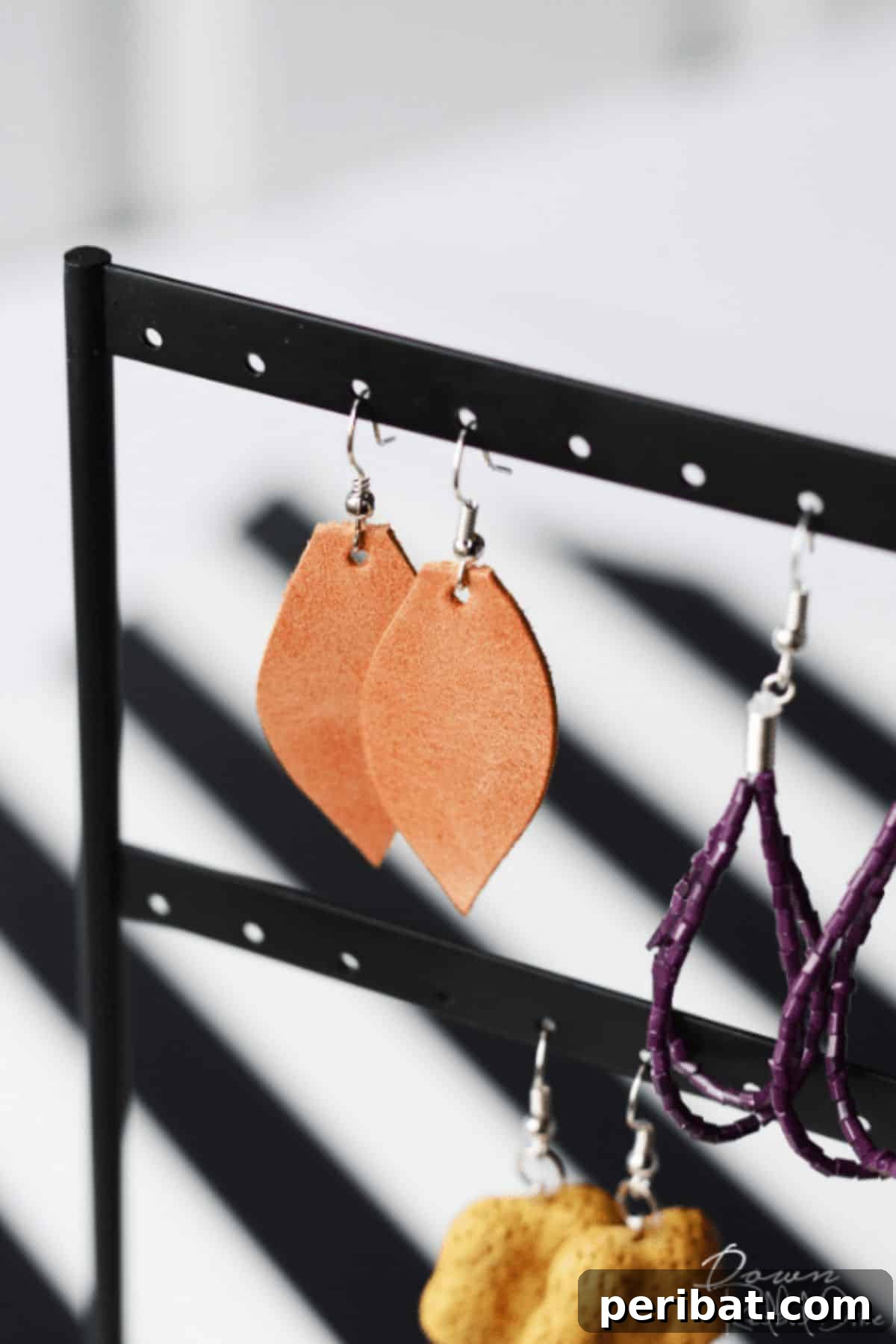 Stunning & Simple: 50 Creative Earring Projects 9 DIY Leather Dangle Earrings