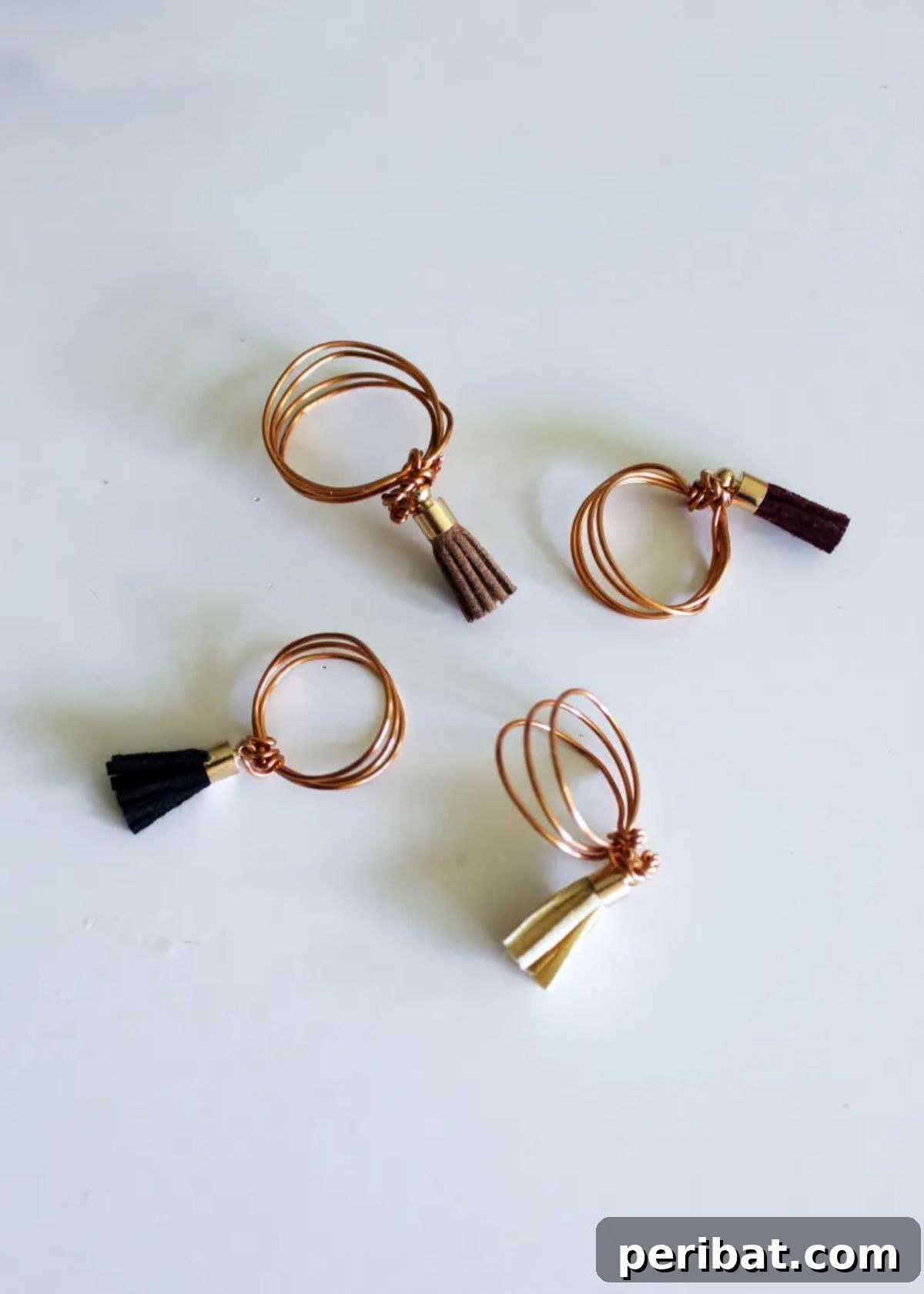 45 Creative DIY Ring Ideas 3 DIY Wire Ring with Leather Tassels
