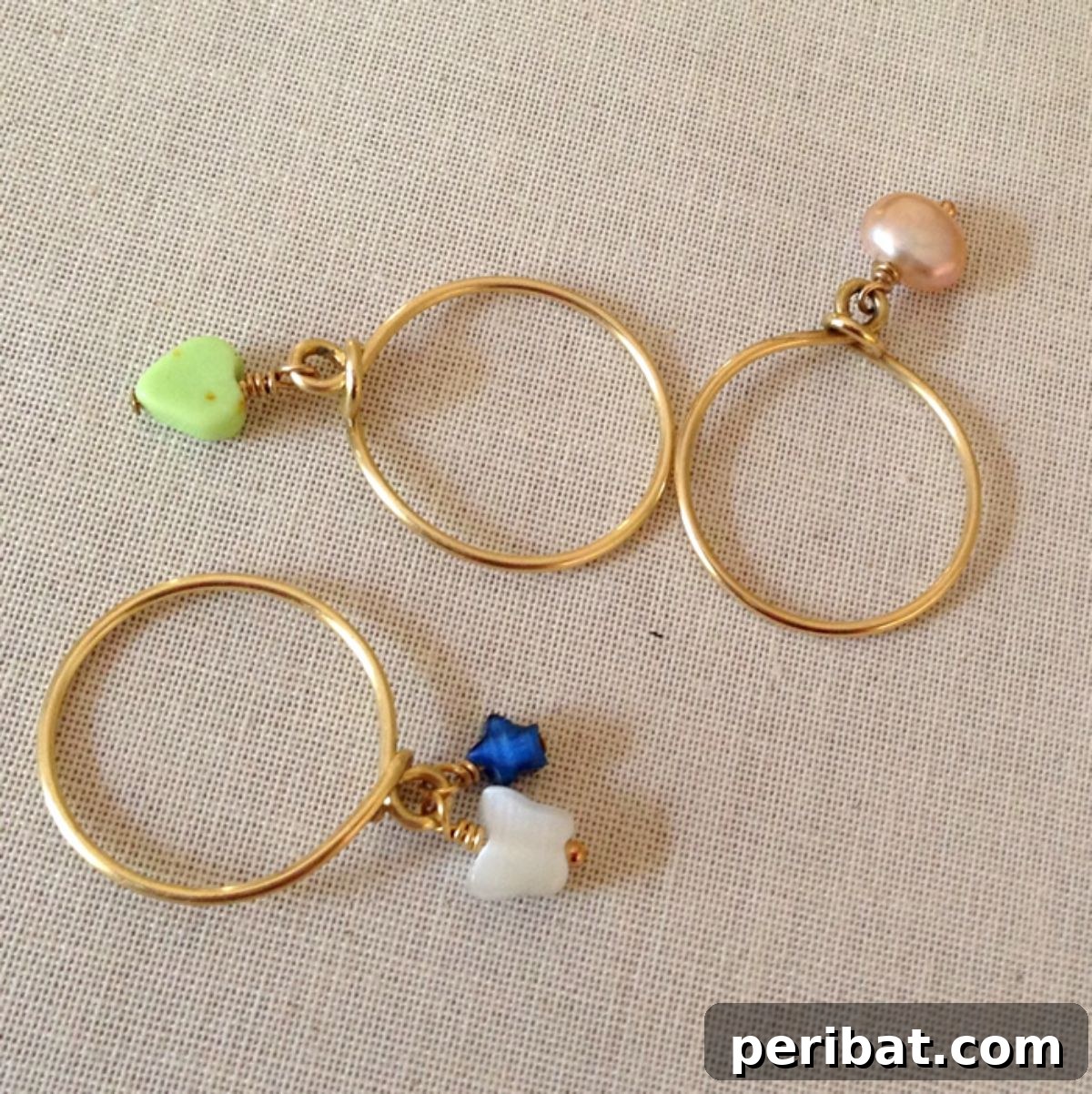 45 Creative DIY Ring Ideas 41 DIY Wire Wrap Stacking Ring with Bead Dangles