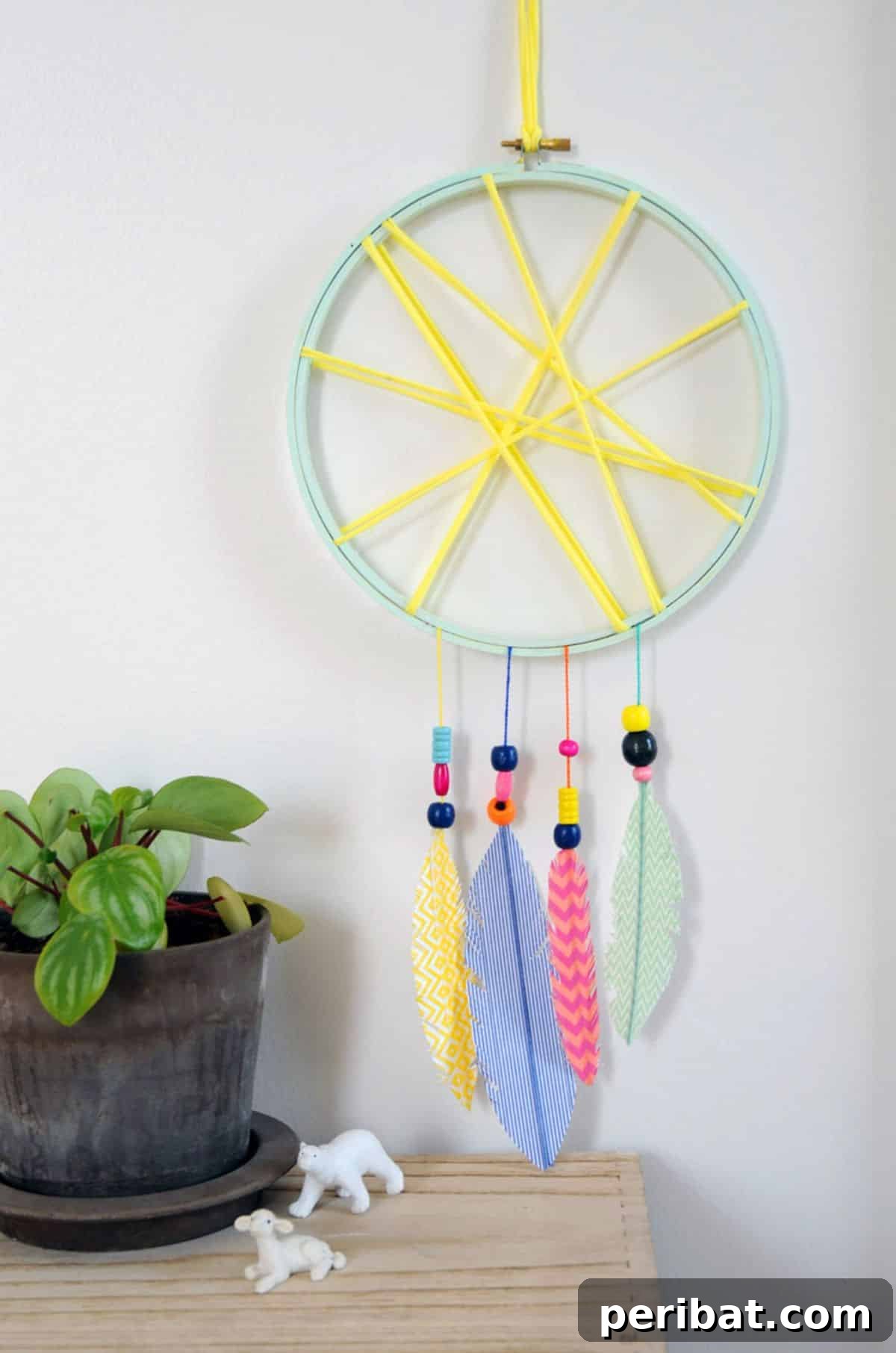 Crafting Dream Catchers: 50 DIY Ideas and Starter Kits 37 DIY Multicolored Kid-Friendly Feather and Bead Dream Catcher