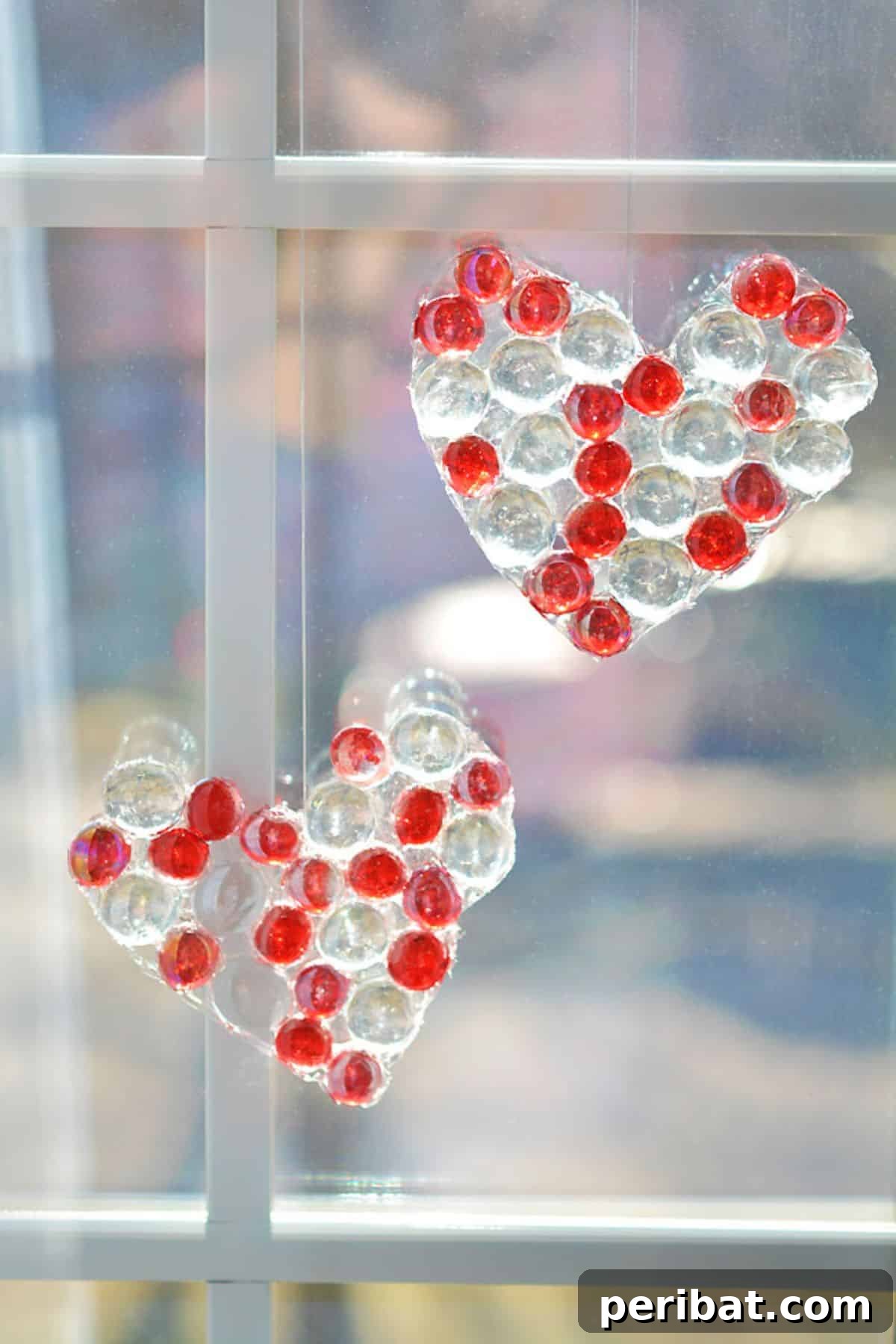 Catch the Light: 50 Unique Sun Catcher Crafts 15 DIY Glass Bead Heart Suncatcher