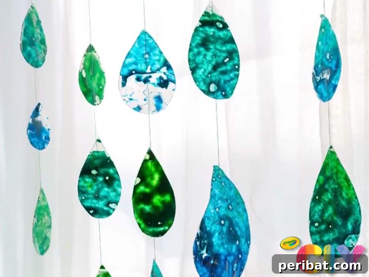 Catch the Light: 50 Unique Sun Catcher Crafts 17 DIY Raindrop Suncatcher