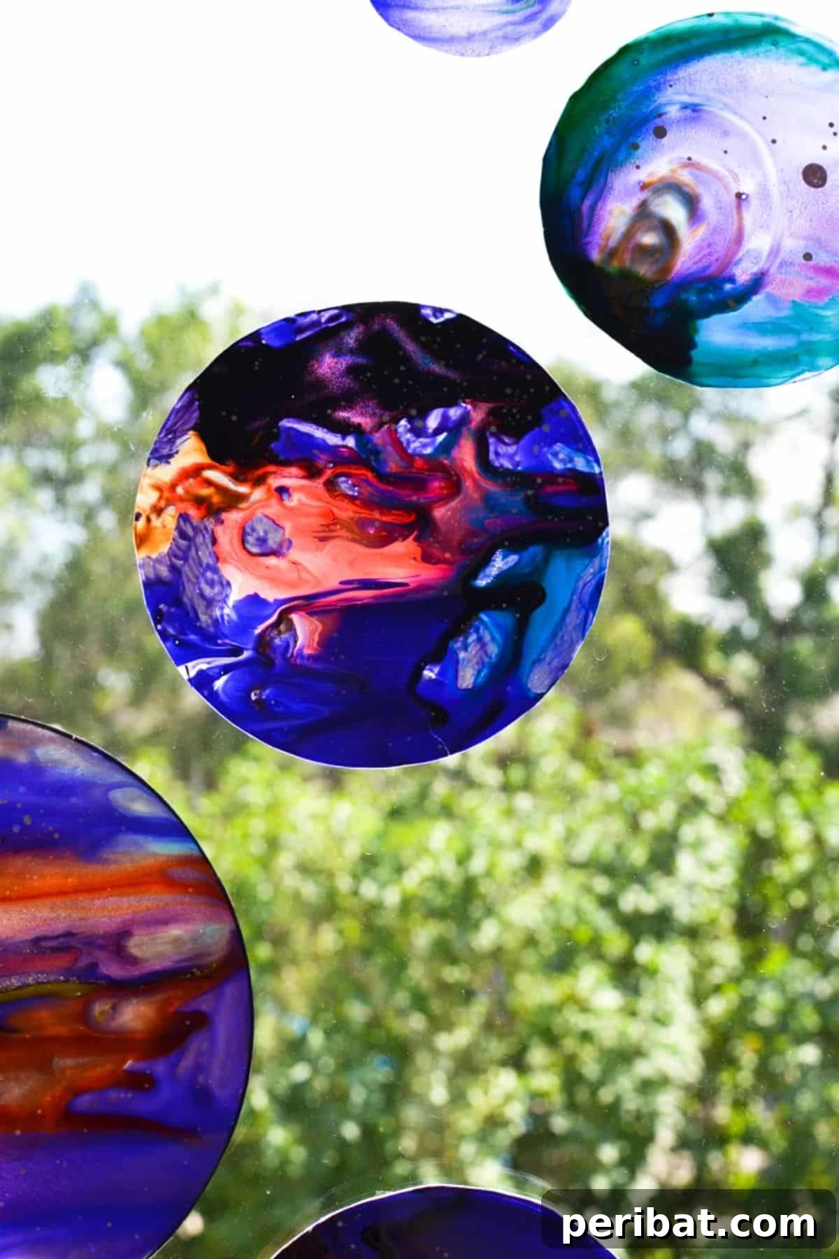 Catch the Light: 50 Unique Sun Catcher Crafts 25 DIY Space Stained Glass Suncatchers