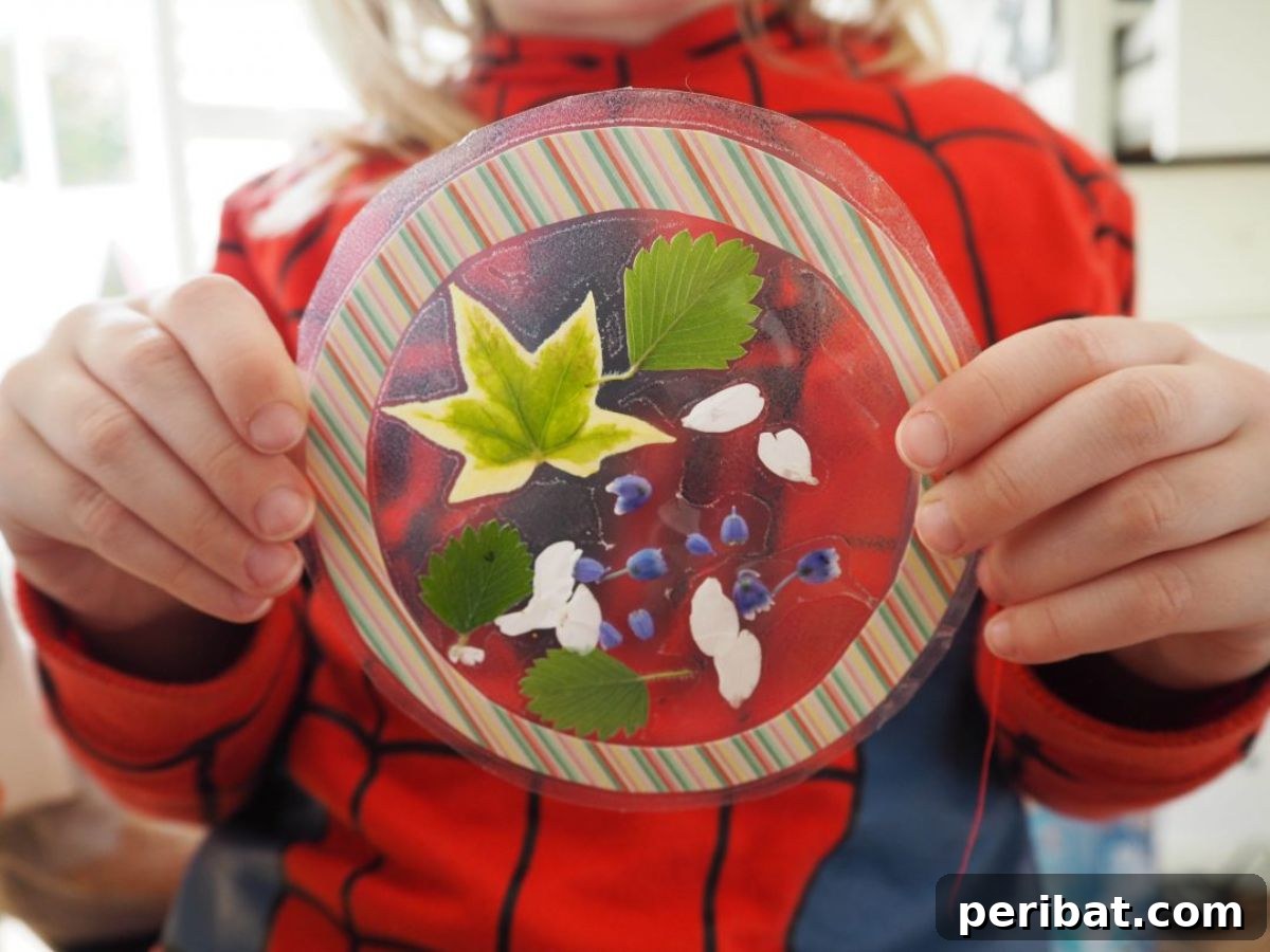 Catch the Light: 50 Unique Sun Catcher Crafts 33 DIY Spring Blossom Sun Catchers