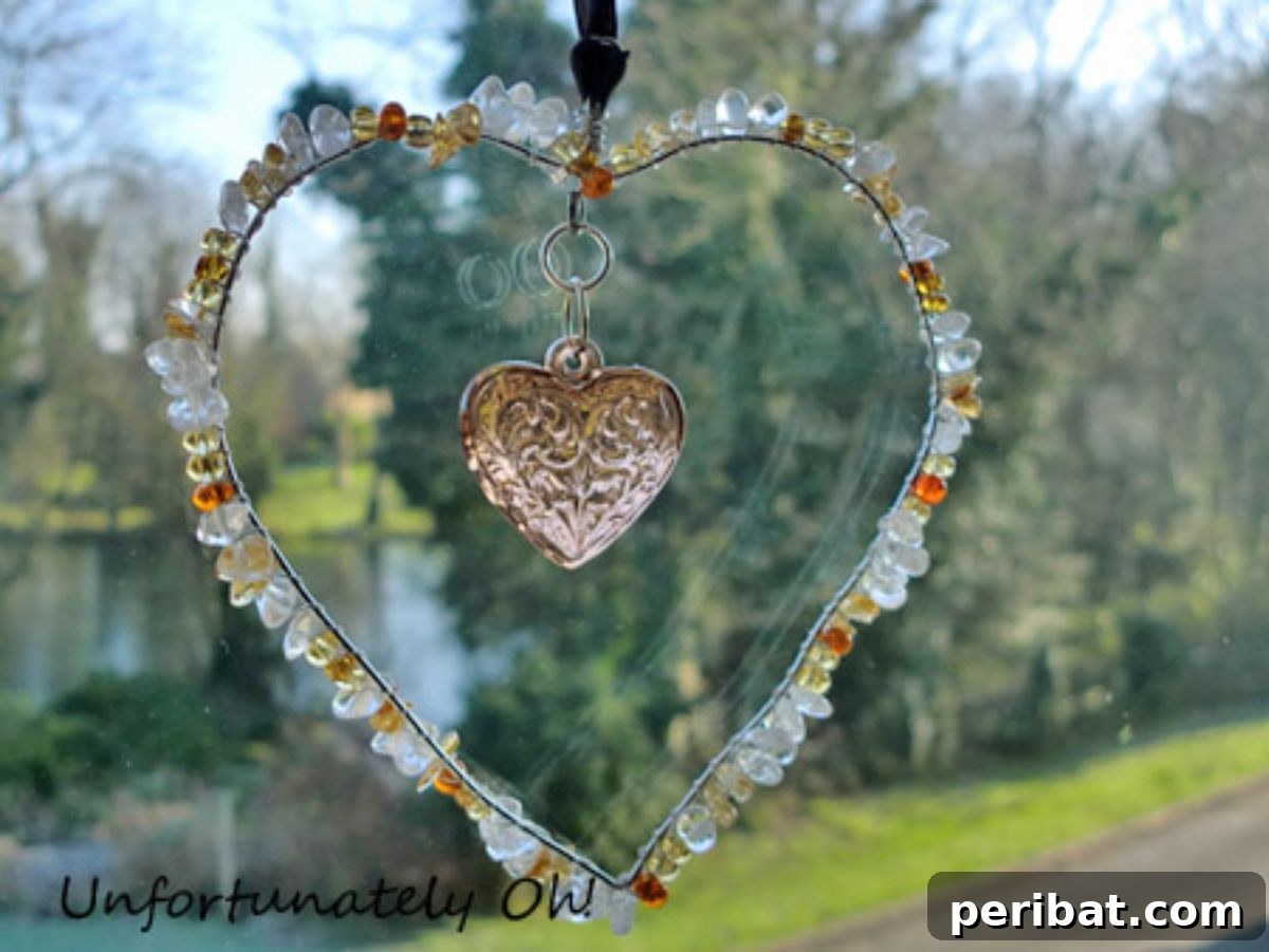 Catch the Light: 50 Unique Sun Catcher Crafts 43 DIY Beaded Heart Suncatcher