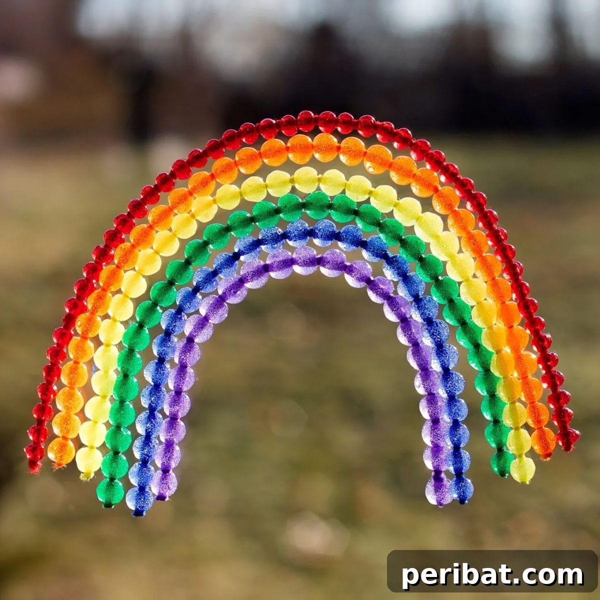Catch the Light: 50 Unique Sun Catcher Crafts 8 DIY Fused Bead Rainbow Suncatcher