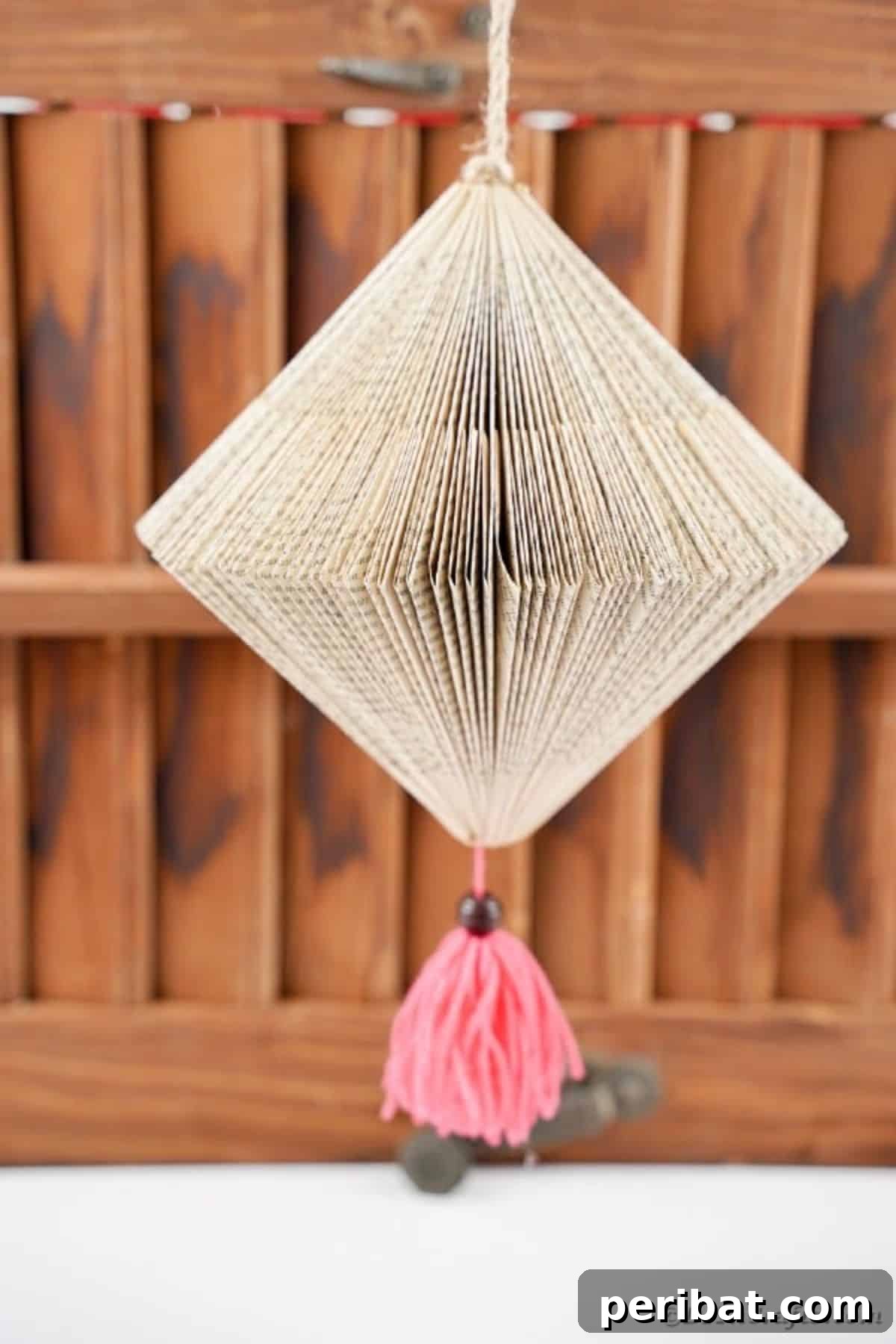 26 DIY Eclectic Decor Ideas to Spark Your Creativity 21 DIY Hanging Old Book Lantern