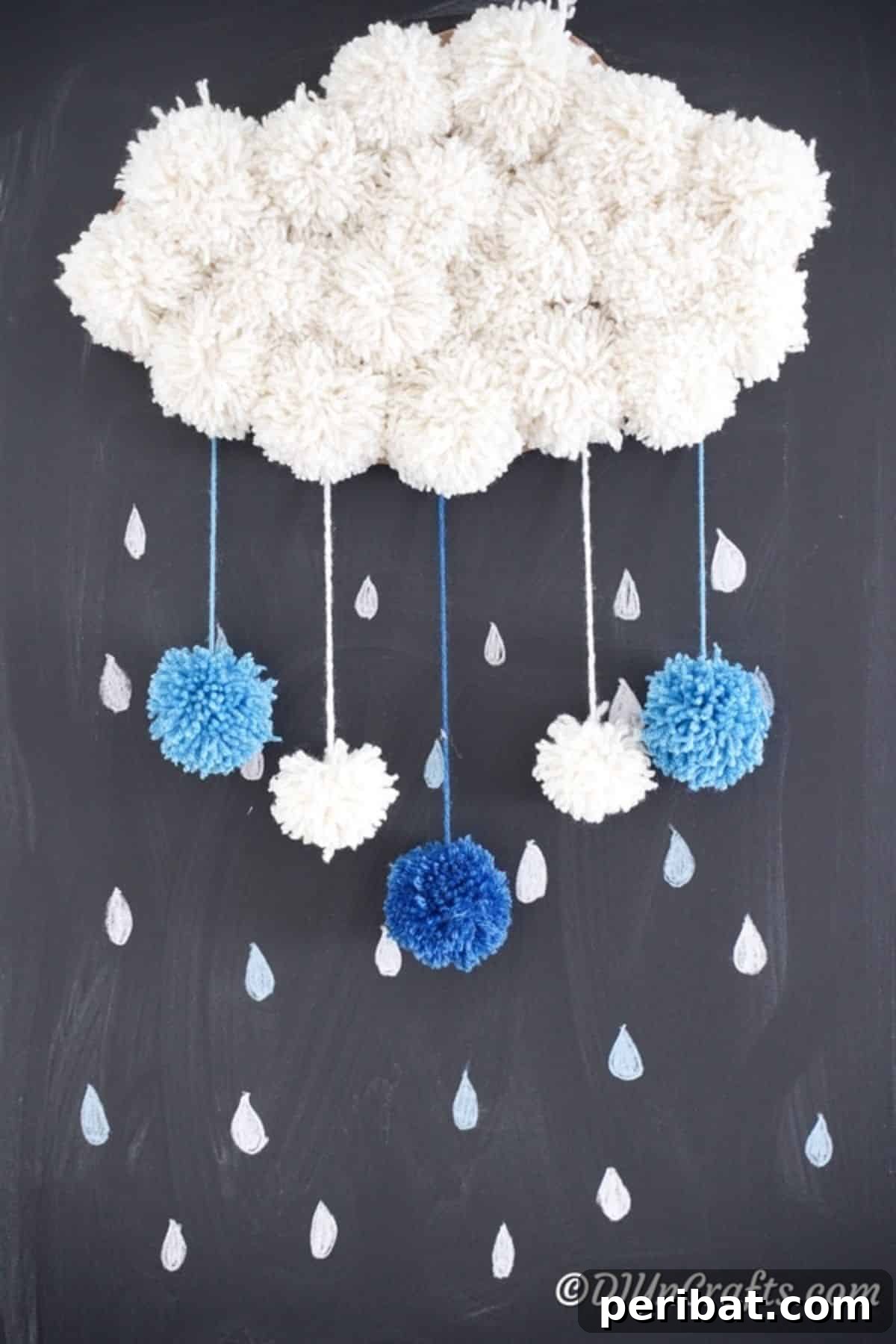 26 DIY Eclectic Decor Ideas to Spark Your Creativity 22 DIY Yarn Pom Pom Cloud Wall Art