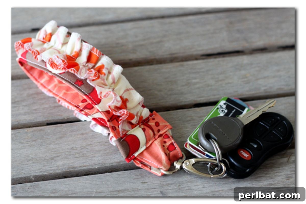 Craft 50 Amazing DIY Keychains 27 DIY Ruffled Keychain Fabric Key Fob