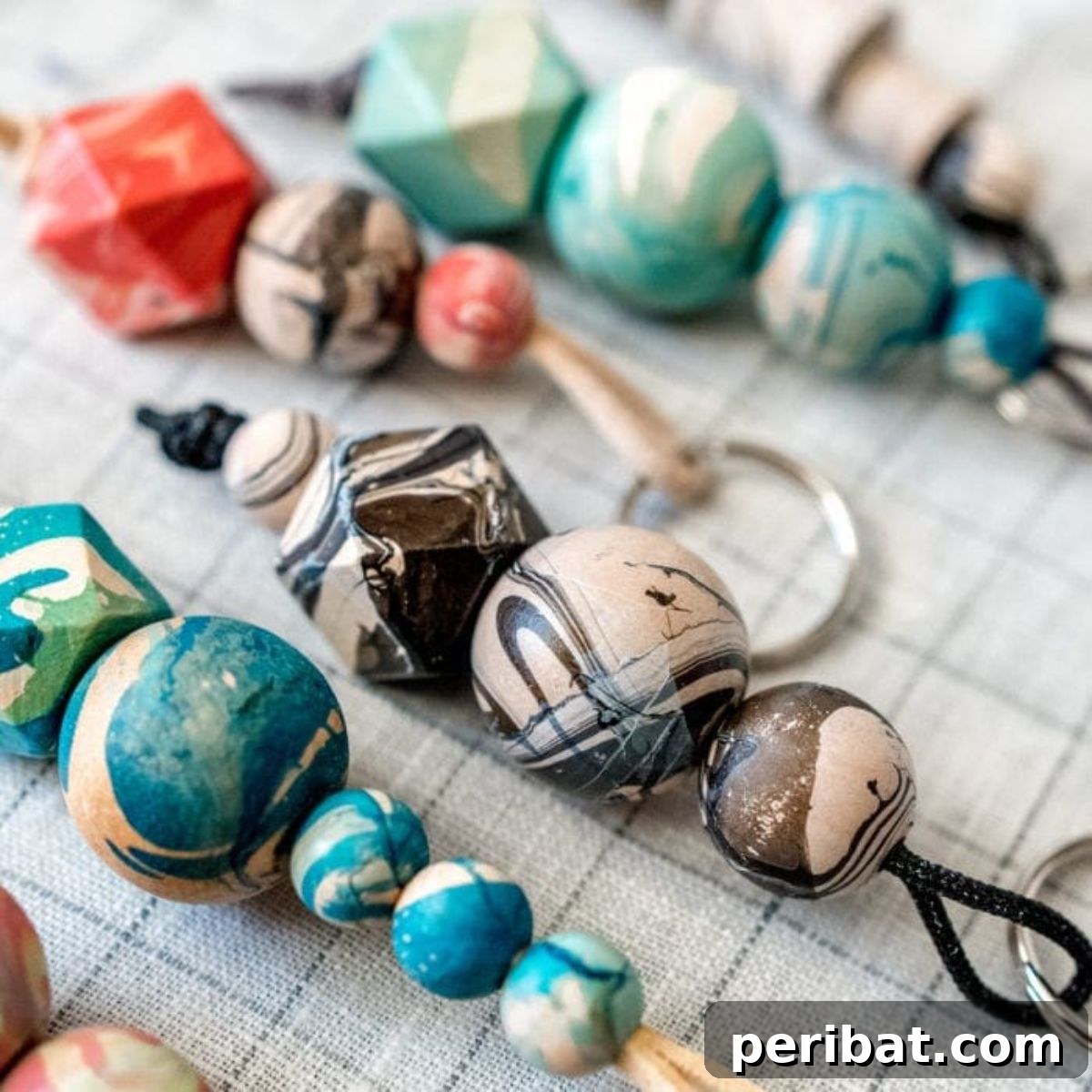 Craft 50 Amazing DIY Keychains 34 DIY Marbled Wood Bead Keychain