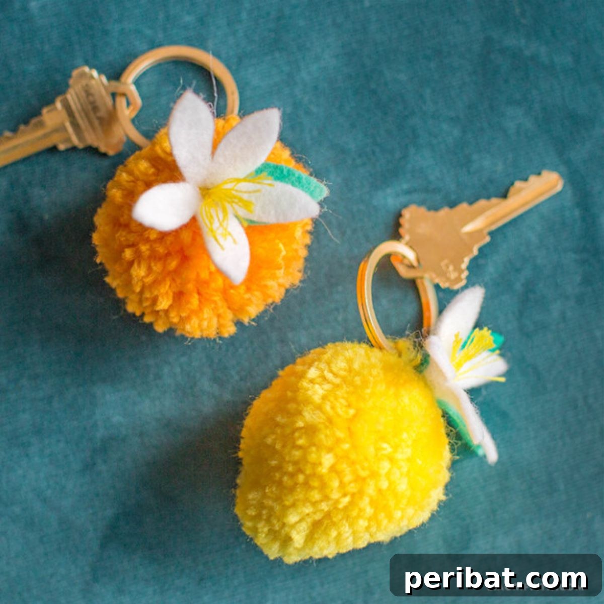 Craft 50 Amazing DIY Keychains 44 DIY Citrus Pom Pom Keychains