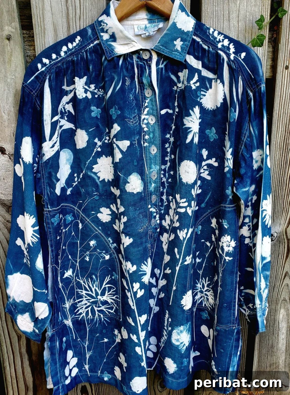 Solar Artistry: 20 DIY Printmaking Ideas 15 Lillian Cyanotype Top with a botanical print of wildflowers.