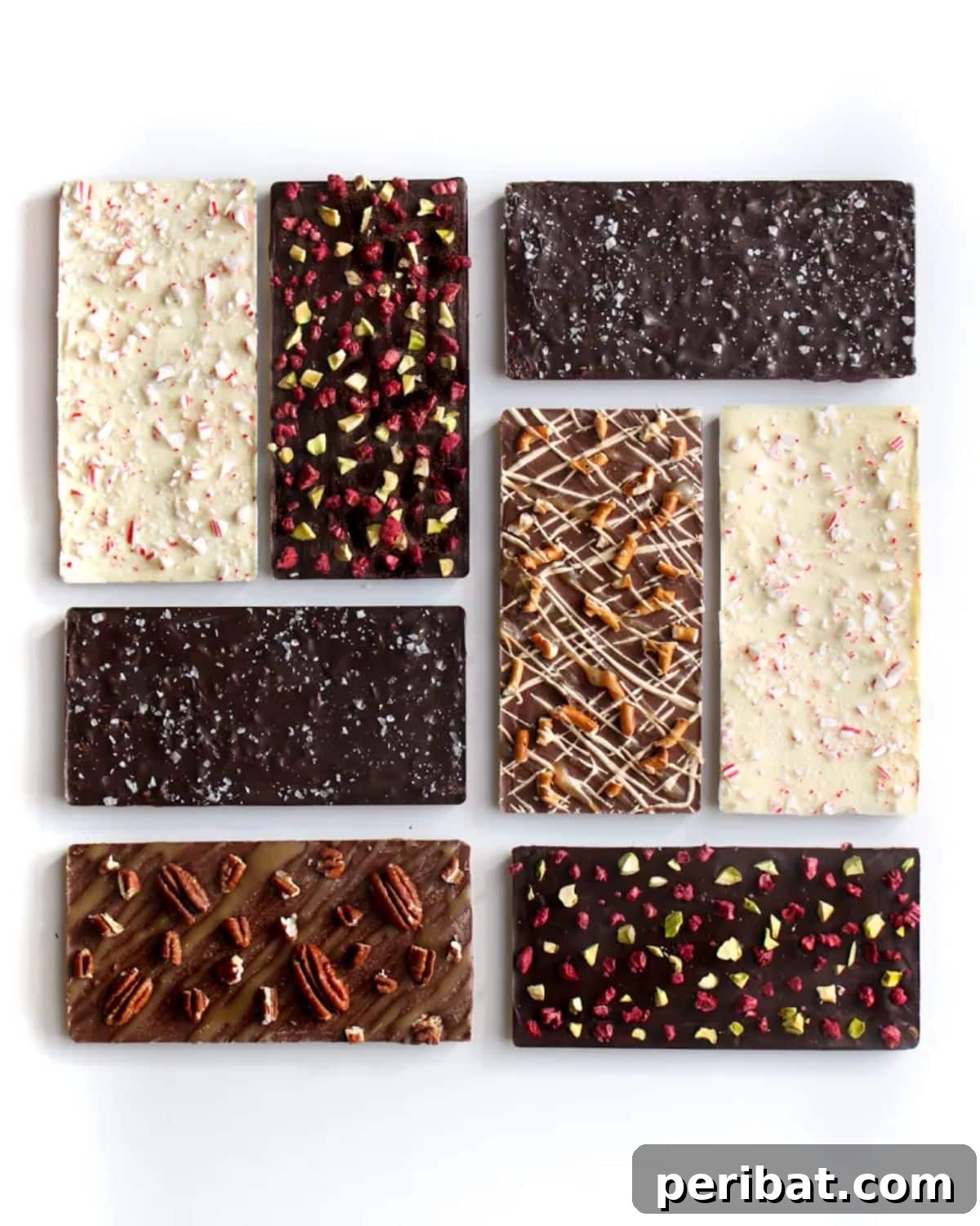 25 Delicious DIY Chocolate Kit Projects 17 Various homemade chocolate bars with different toppings like nuts and dried fruits.