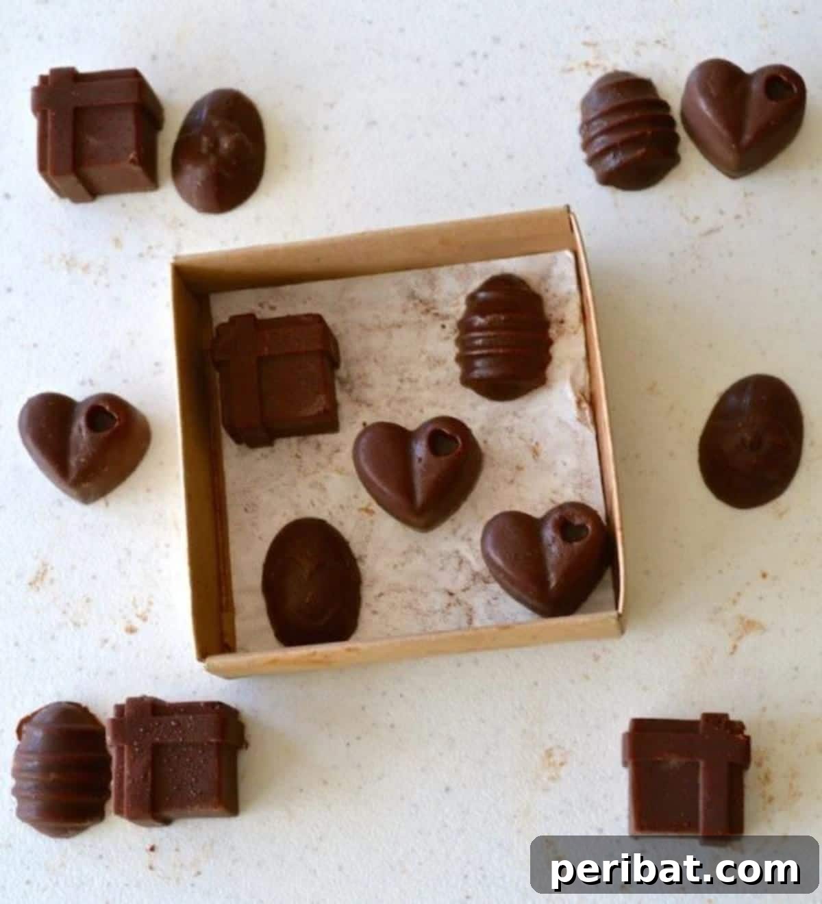 25 Delicious DIY Chocolate Kit Projects 25 Three simple ingredients laid out to make chocolate: cacao powder, coconut oil, and maple syrup.