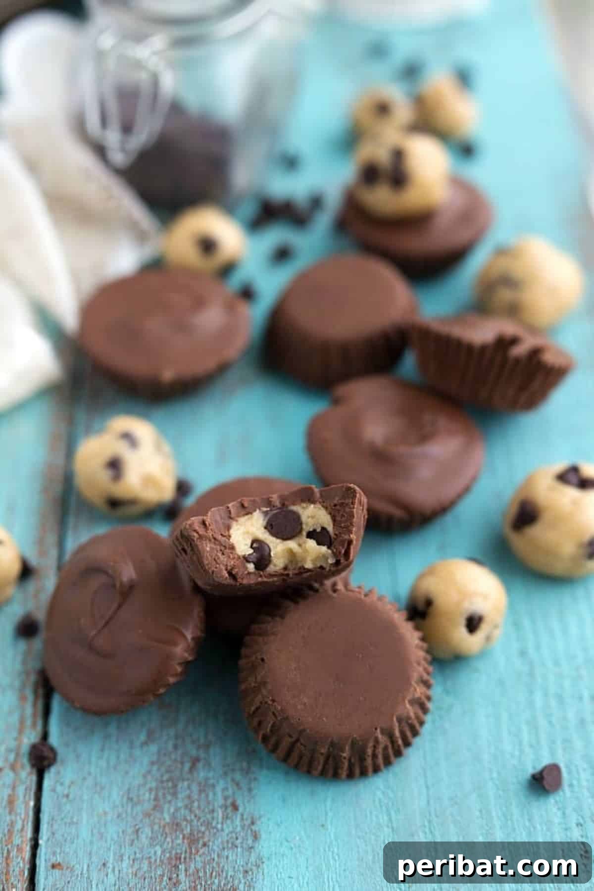 25 Delicious DIY Chocolate Kit Projects 7 Appetizing no-bake cookie dough chocolate cups, showcasing a perfect blend of cookie dough and chocolate.