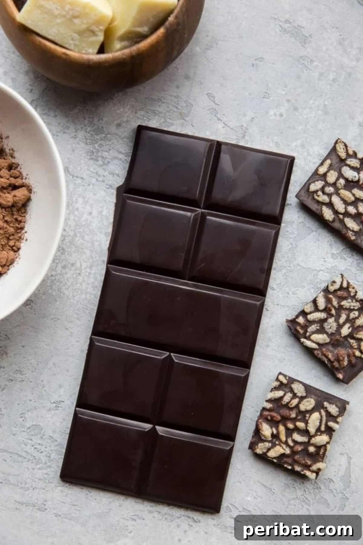 25 Delicious DIY Chocolate Kit Projects 8 Freshly made dark chocolate bars resting on a cooling rack.