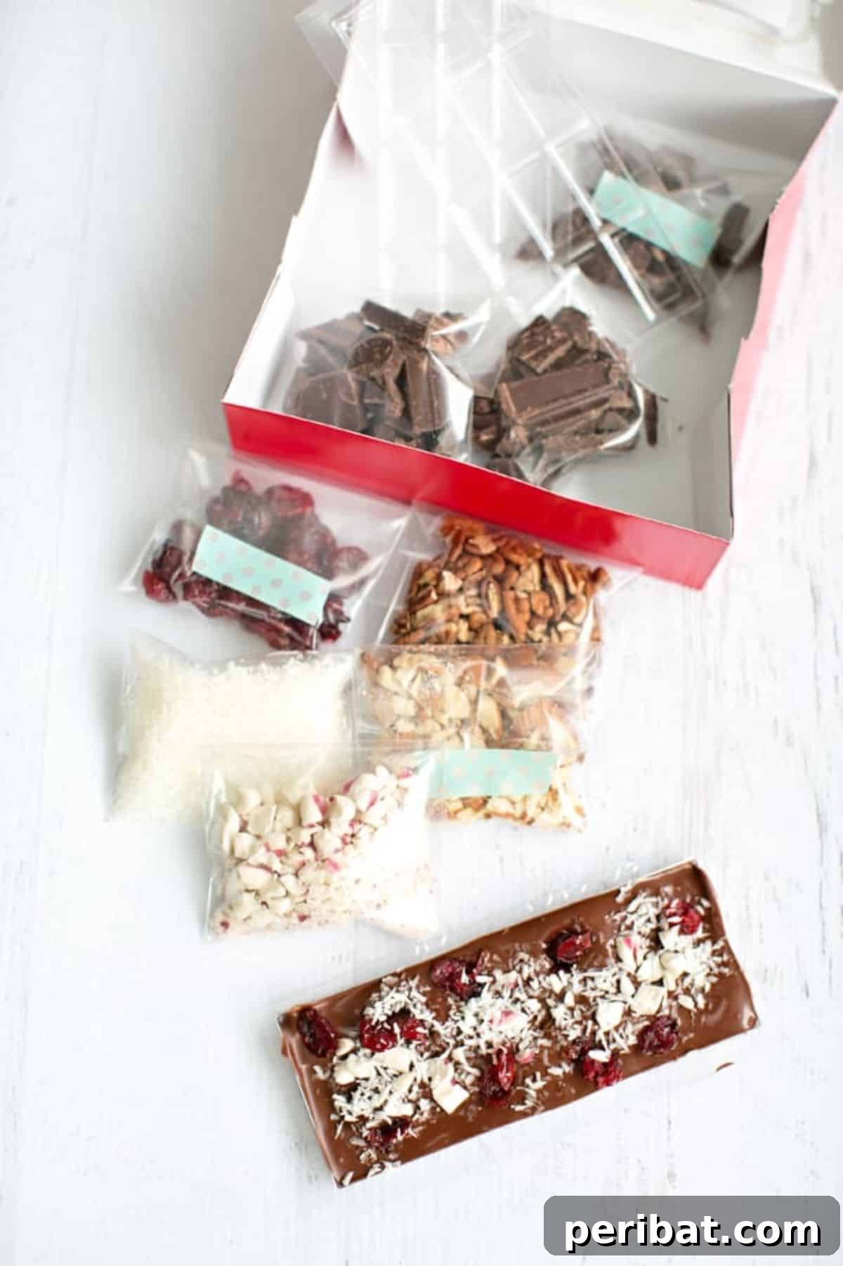 25 Delicious DIY Chocolate Kit Projects 10 A vibrant DIY chocolate bar kit featuring various toppings, molds, and chocolate ingredients.