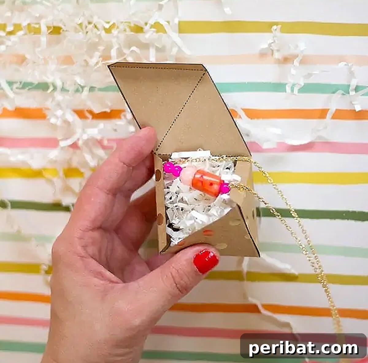 52 Inspiring DIY Necklace Ideas and Kits for Stunning Handmade Jewelry 11 hand holding gift box and bead pendant necklace