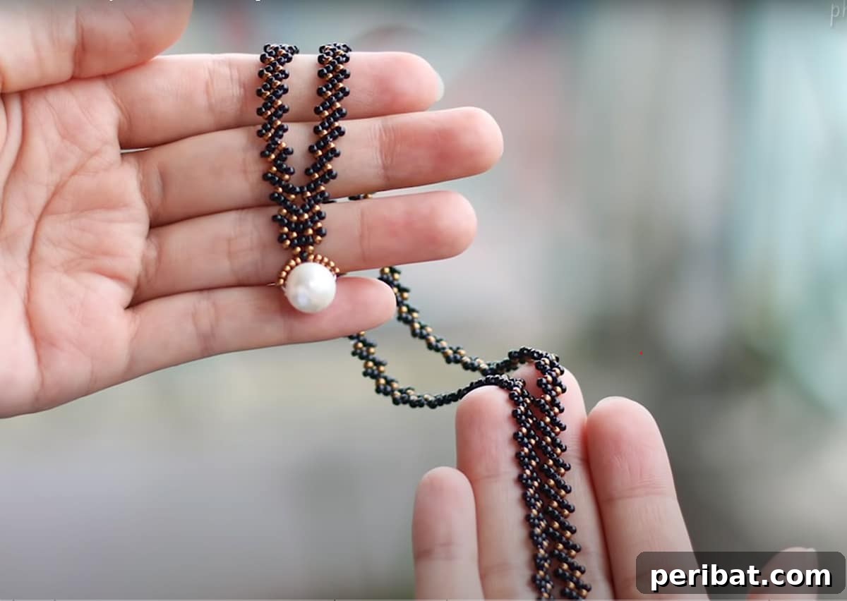 52 Inspiring DIY Necklace Ideas and Kits for Stunning Handmade Jewelry 29 hand holding minimalist beaded necklace with only seed beads