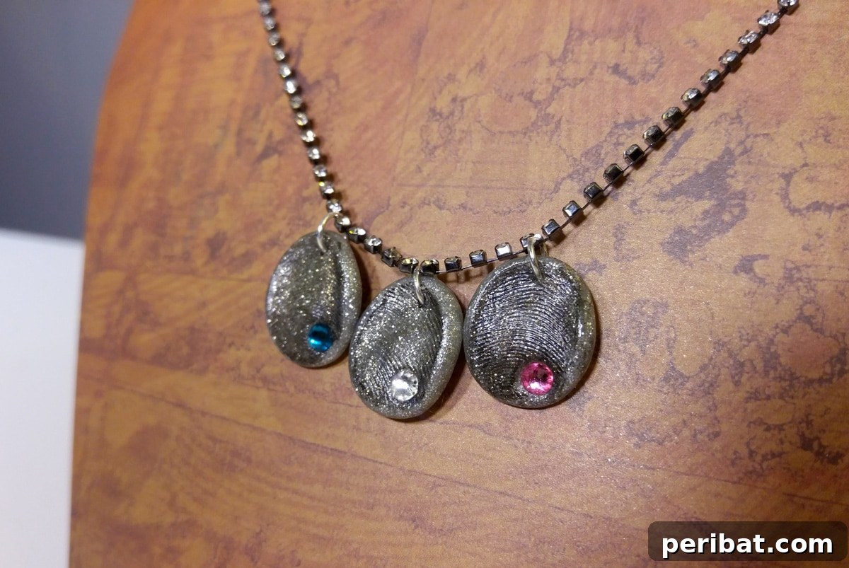 52 Inspiring DIY Necklace Ideas and Kits for Stunning Handmade Jewelry 33 sentimental fingerprint birthstone necklace on a table