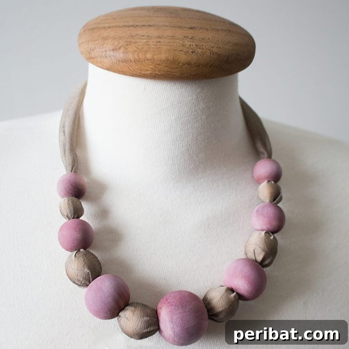 52 Inspiring DIY Necklace Ideas and Kits for Stunning Handmade Jewelry 38 luxurious berry silk necklace worn on a mannequin