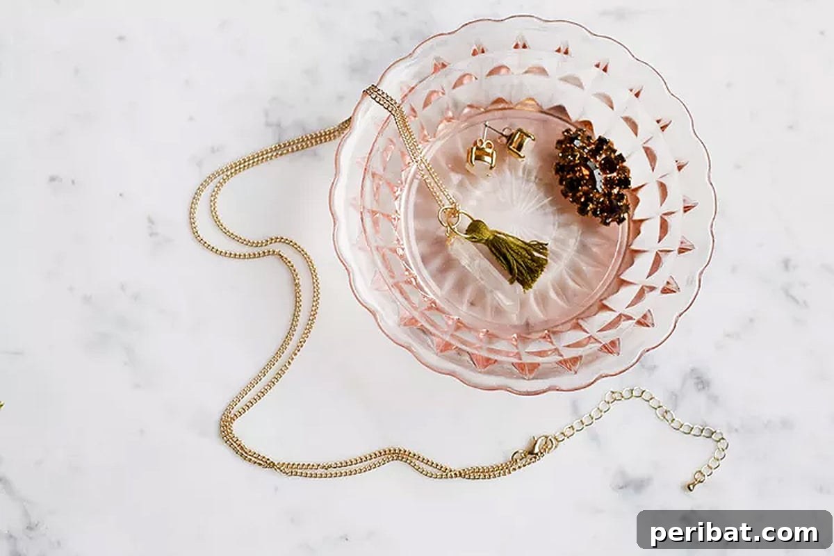52 Inspiring DIY Necklace Ideas and Kits for Stunning Handmade Jewelry 44 bohemian necklace with a stone and tassel in a bowl