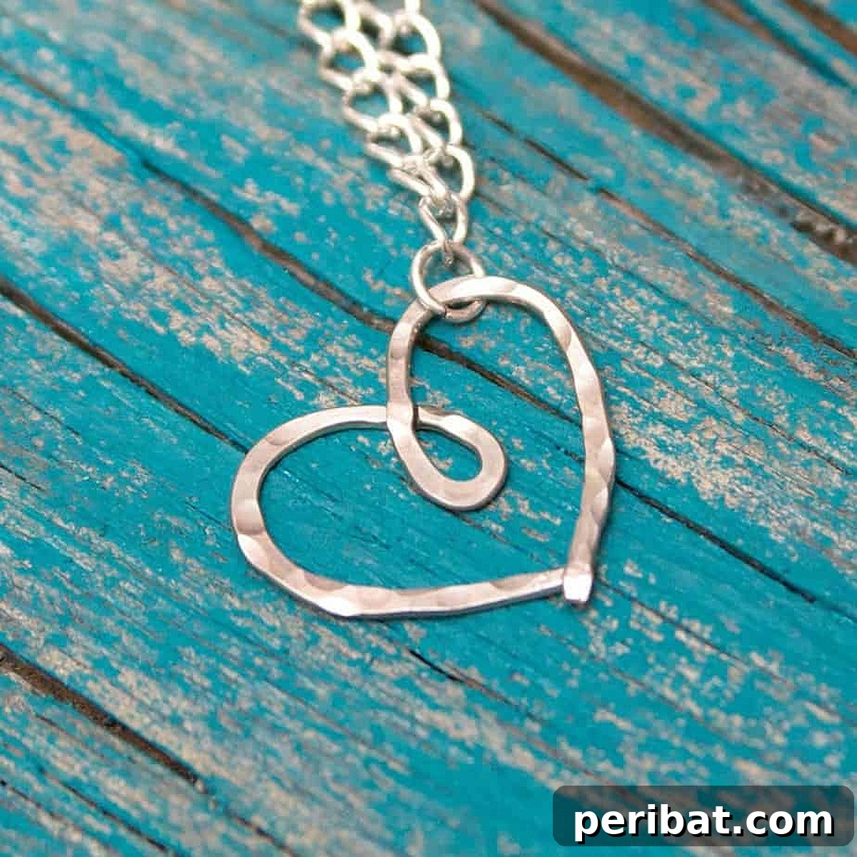 52 Inspiring DIY Necklace Ideas and Kits for Stunning Handmade Jewelry 48 delicate hammered heart necklace on a wooden table