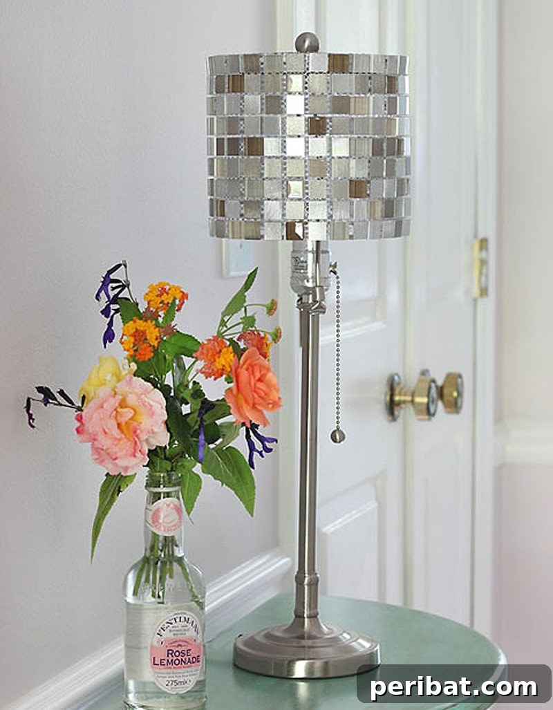 Dazzling mosaic tile lamp shade and a matching flower vase, transformed into a custom lighting masterpiece.