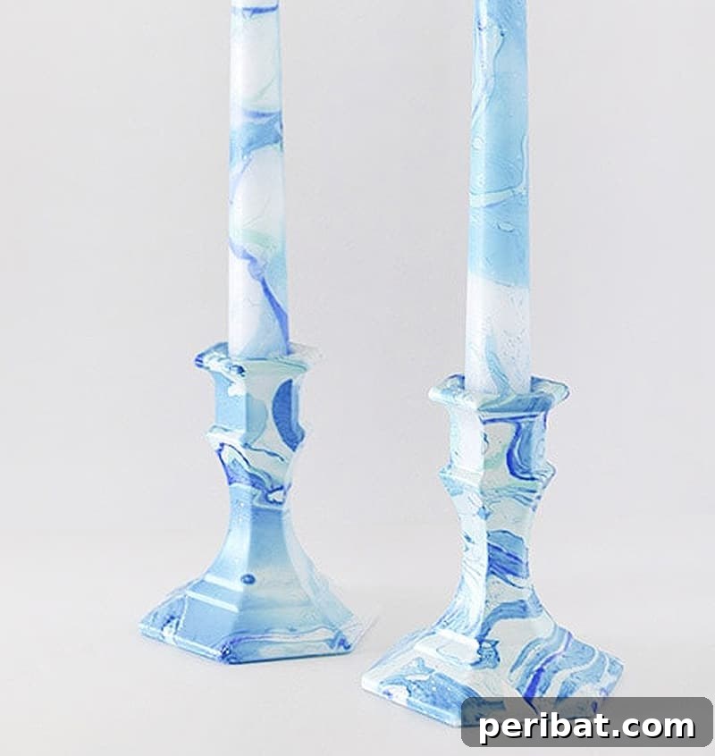 two blue marbling candle holders and candles