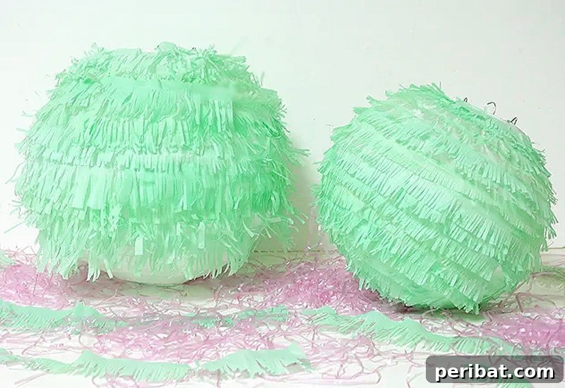 two fringe paper lanterns