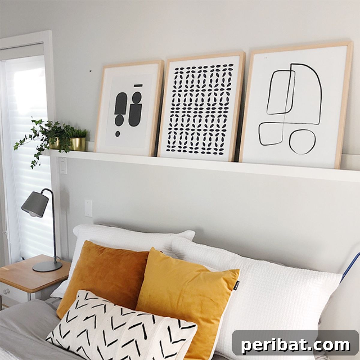 Easy-to-make DIY Picture Ledge with pristine white finish