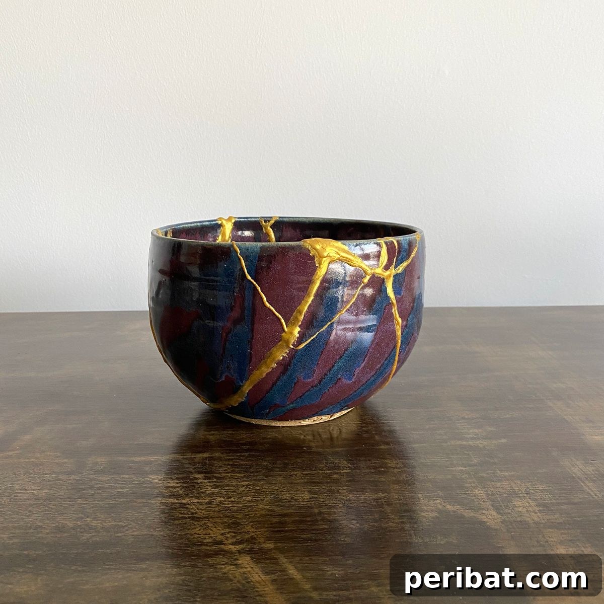 21 DIY Kintsugi Kits: Discover the Art of Golden Mending 17 Pot fixed with Kintsugi method, demonstrating a DIY repair process for ceramics.