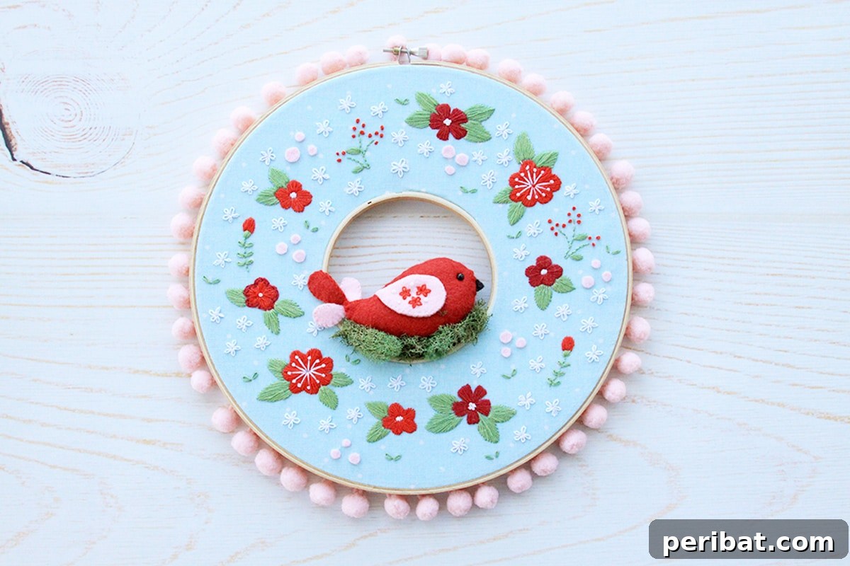 Creative DIY Floral Embroidery Ideas and Projects 30 Elegant DIY winter floral embroidery hoop wreath, adorned with frosted berries and evergreen motifs