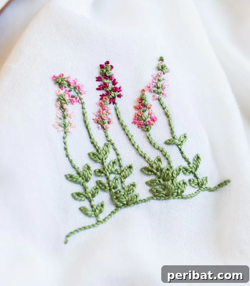 Creative DIY Floral Embroidery Ideas and Projects 37 Beautiful floral embroidery pattern enhancing dishtowels, transforming them into charming kitchen accessories