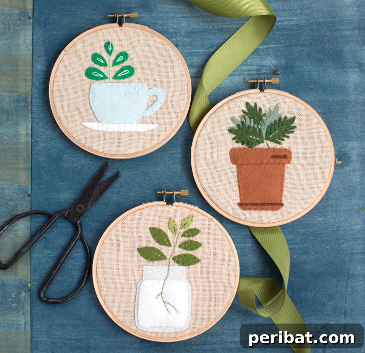 Creative DIY Floral Embroidery Ideas and Projects 39 Three beautiful embroidery pictures of plants and scissors lying on a table, showcasing DIY botanical wall art
