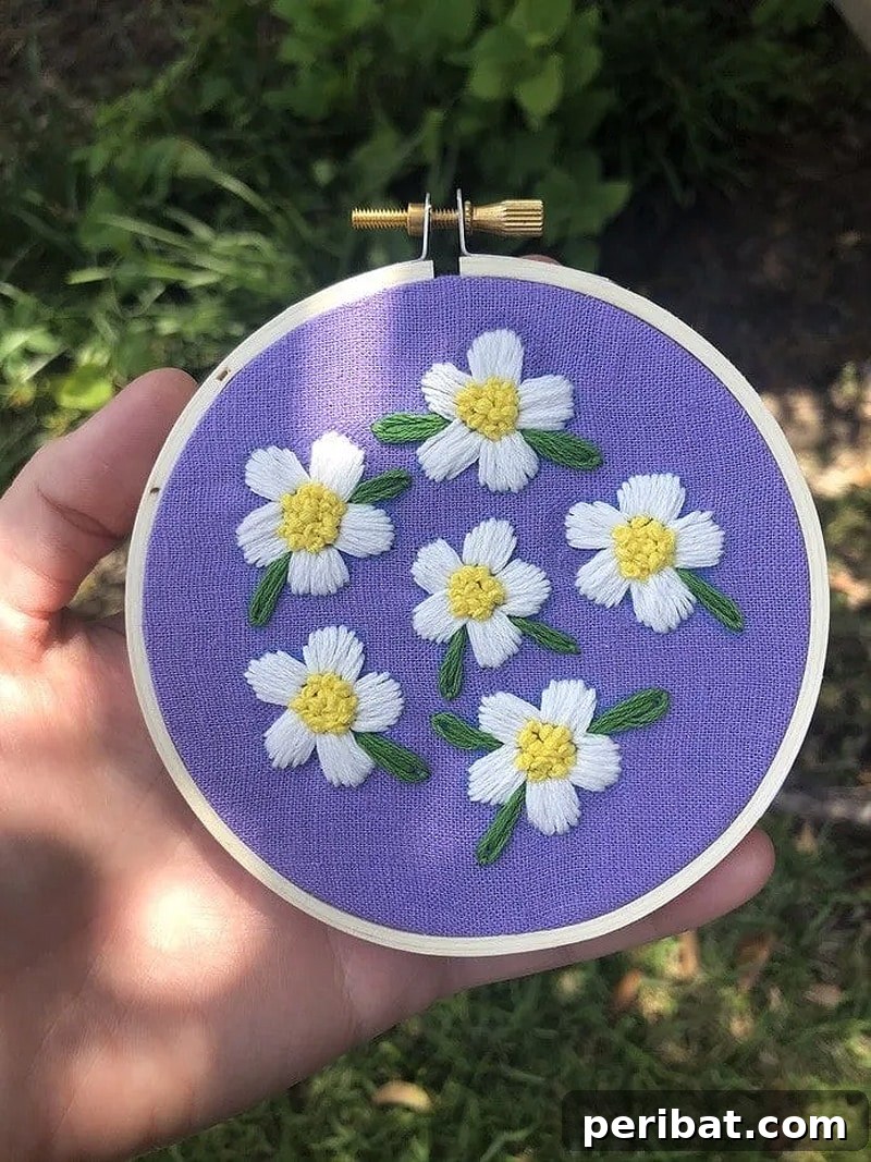 Creative DIY Floral Embroidery Ideas and Projects 45 Delicate hand-embroidered pattern of six chrysanthemums, ideal for beginners to add a touch of nature