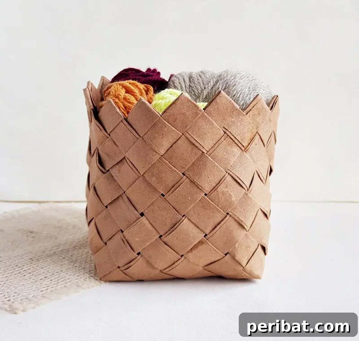 20 Creative DIY Basketry Projects & Kits 5 recycled paper basket holds wool balls