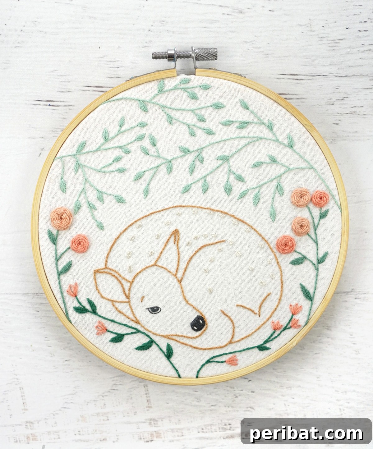 Stitch Your Way to a Merry Christmas: 48 DIY Embroidery Designs 15 An adorable fawn embroidery pattern, capturing the gentle essence of woodland creatures.