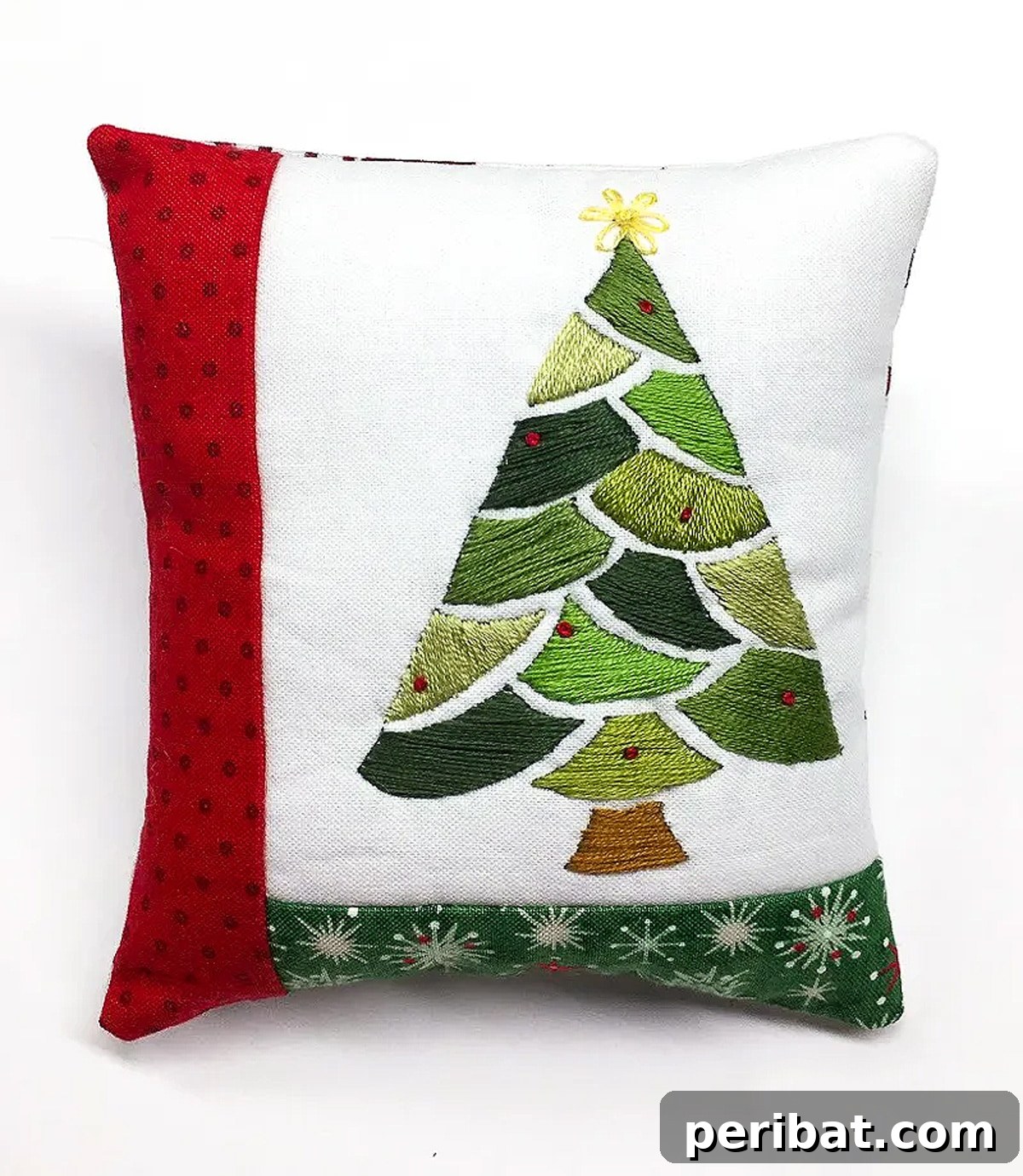 Stitch Your Way to a Merry Christmas: 48 DIY Embroidery Designs 23 A custom Christmas tree embroidered pillow, showcasing creative use of satin stitch.