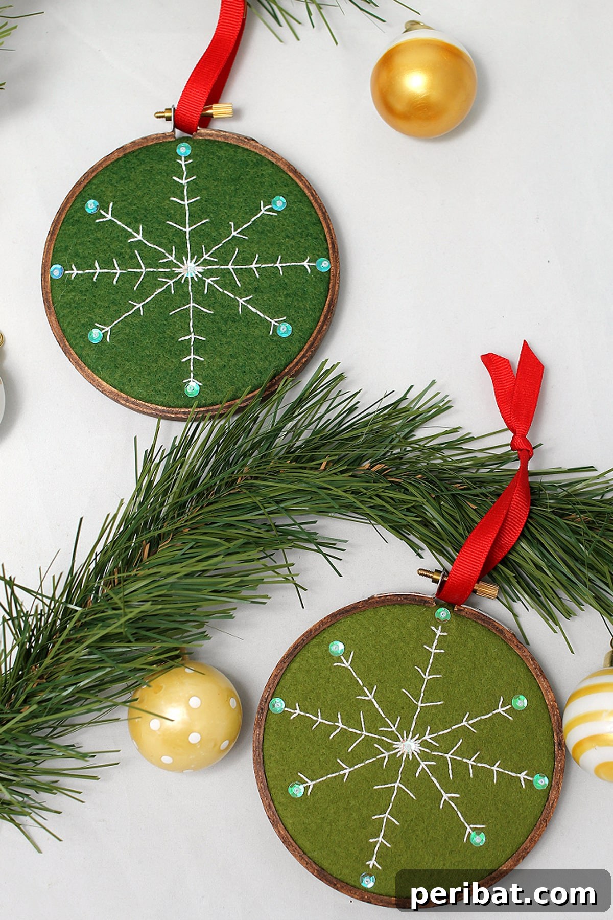 Stitch Your Way to a Merry Christmas: 48 DIY Embroidery Designs 24 Two delicate snowflake ornament patterns, ideal for beginners and embellishment.
