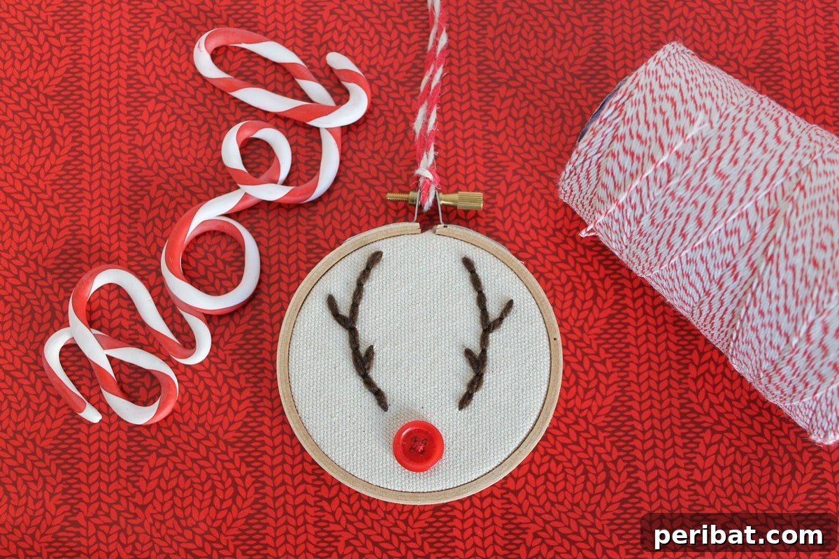 Stitch Your Way to a Merry Christmas: 48 DIY Embroidery Designs 32 A charming rustic reindeer hoop ornament, perfect for adding woodland flair to Christmas decor.