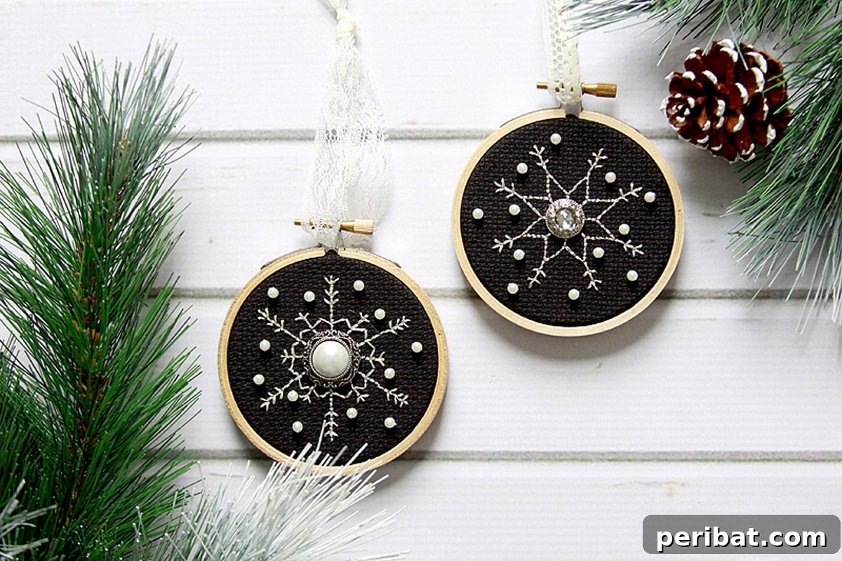 Stitch Your Way to a Merry Christmas: 48 DIY Embroidery Designs 34 Three shimmering snowflake ornaments, crafted with delicate cross-stitch patterns.
