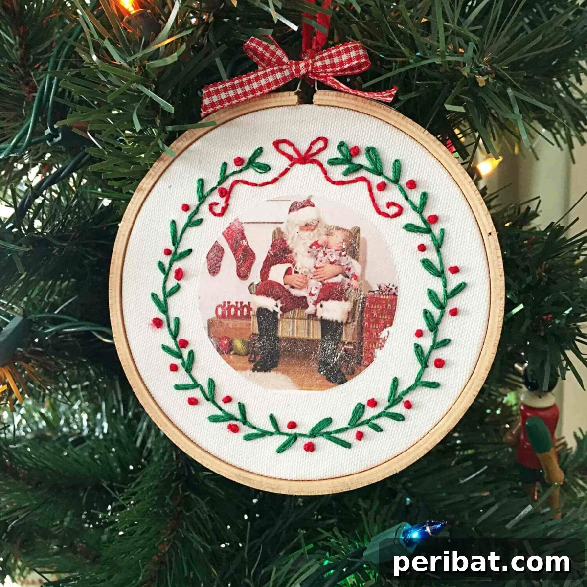 Stitch Your Way to a Merry Christmas: 48 DIY Embroidery Designs 5 Embroidered photo ornaments adorning a Christmas tree, showcasing cherished family memories.