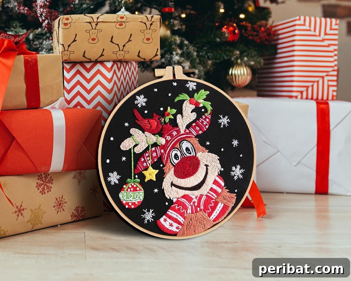 Stitch Your Way to a Merry Christmas: 48 DIY Embroidery Designs 41 An embroidery frame showcasing a festive elk pattern, accompanied by gift boxes, as part of a starter kit.